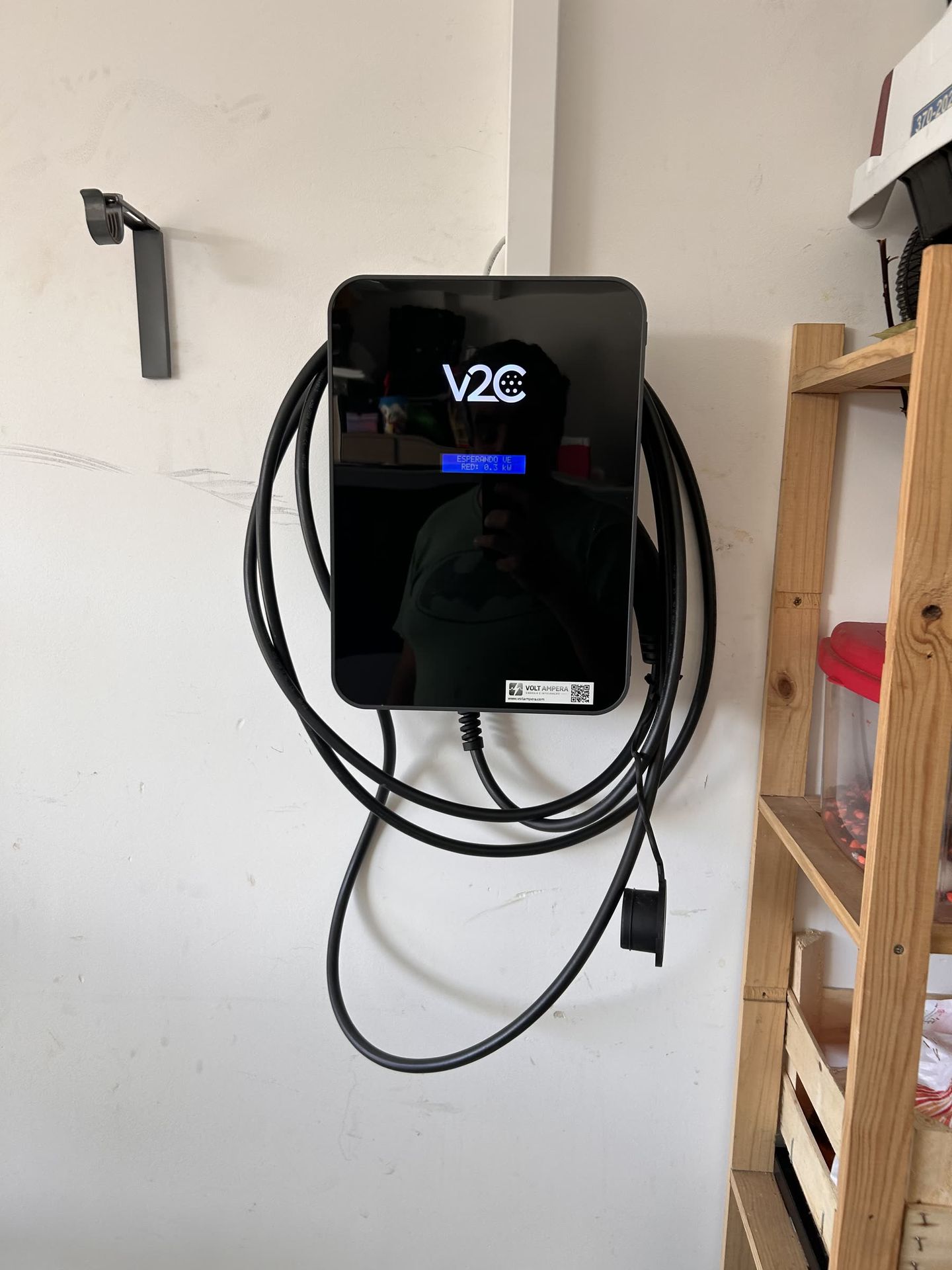 Carregador VE V2C instalado em garagem com gestão dinâmica de carga
